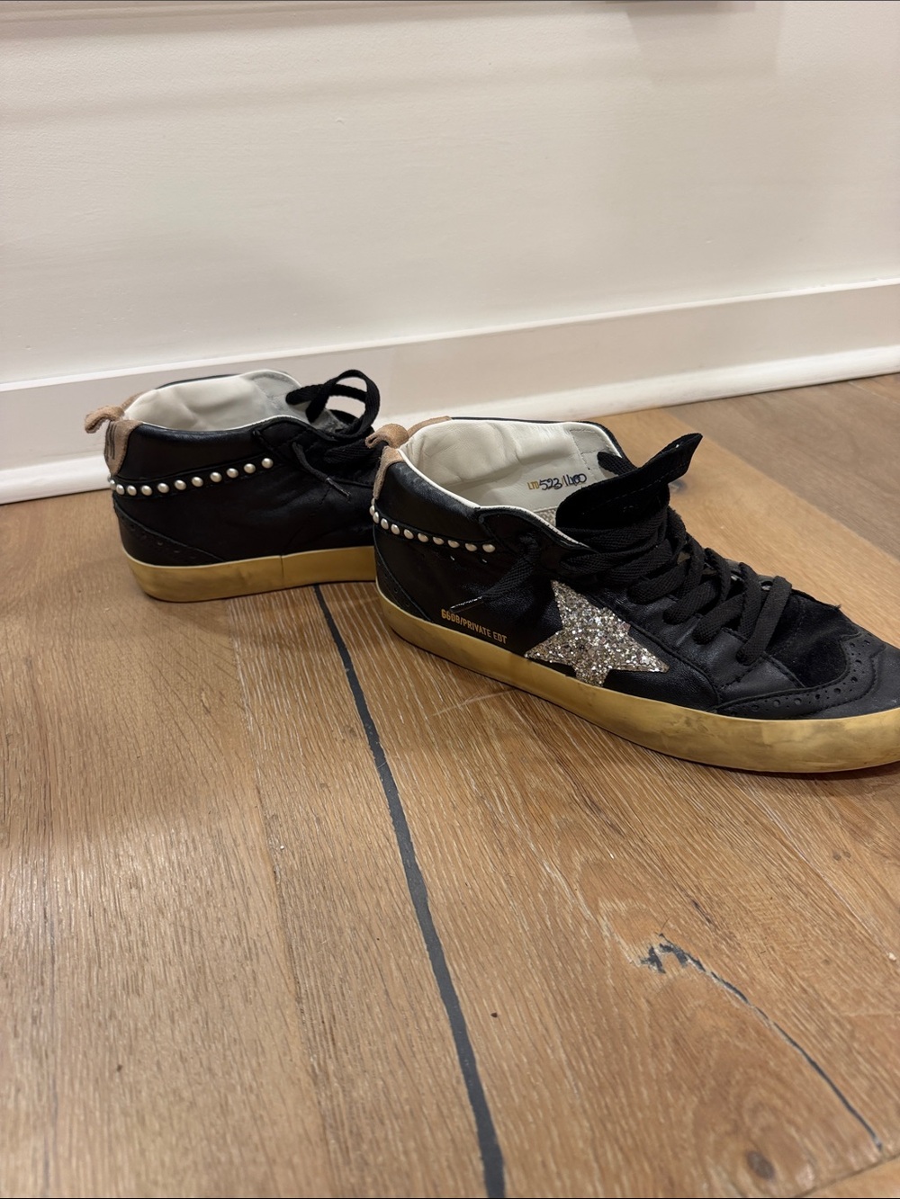 Golden Goose Mid Star Leather Sneaker in Black, White and Beige